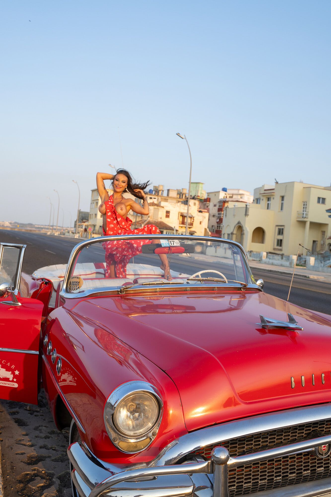 Monika Fox In Red Dress On Waterfront In Rare Car