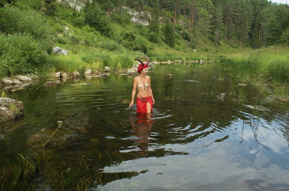 With Horns In Red Dress In Shallow River #9