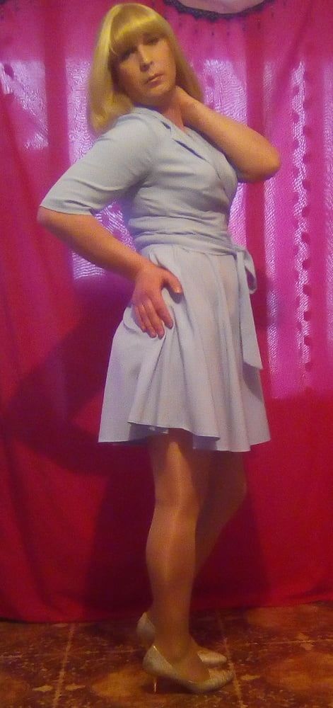 in a blue dress