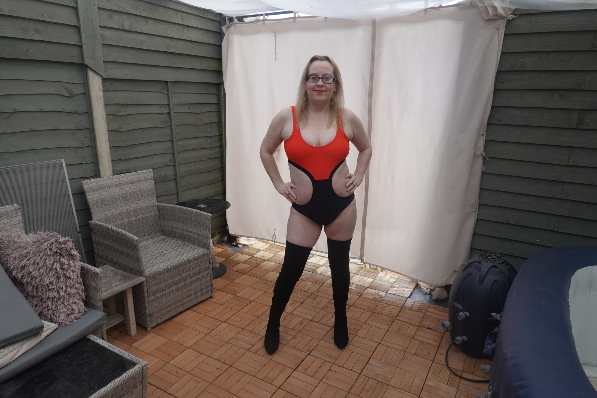 In the yard in 2 Degrees temp in swimsuit and thigh boots