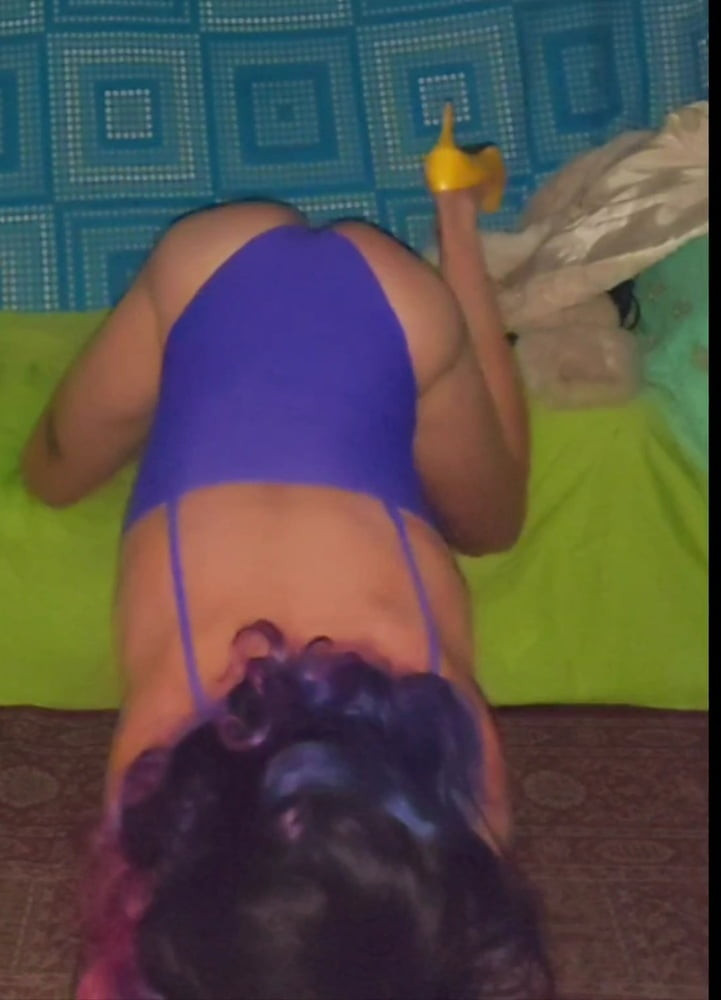 Purple swimsuit and wand album