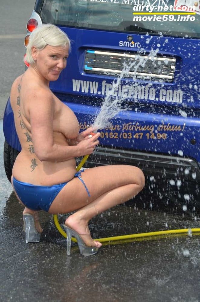 Jill Summer at the carwash in a bikini and topless #54