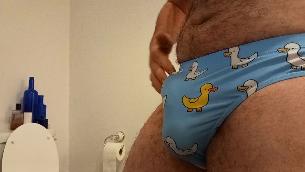 Small penis bulge cum in cute duck speedo, brief, trunks. #17