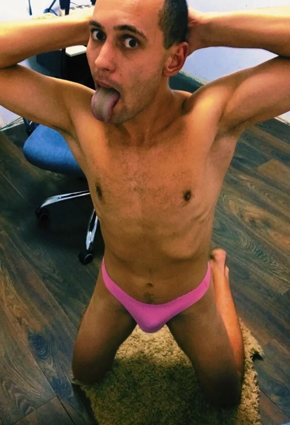 Twink boy poses in a pink thong  #4