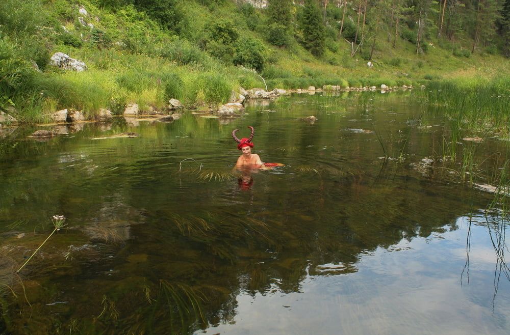 With Horns In Red Dress In Shallow River #39