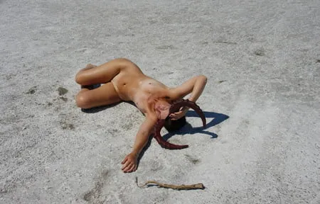 lying naked on the salt of the saltlake elton russia         