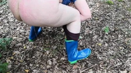 peeing in rubber boots         