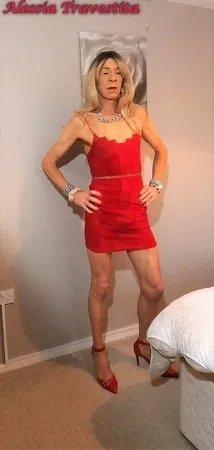    alessia travestita in red velvet dress         