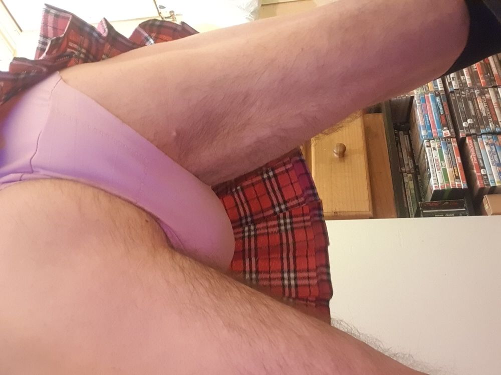 Panty boy wearing slutty schoolgirl skirt flashing pink pant #5