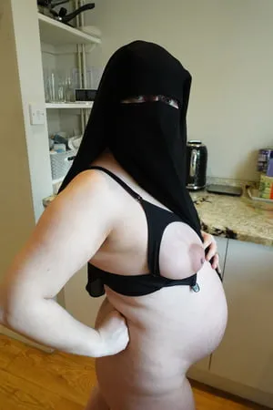 pregnant wife in muslim niqab and nursing bra         