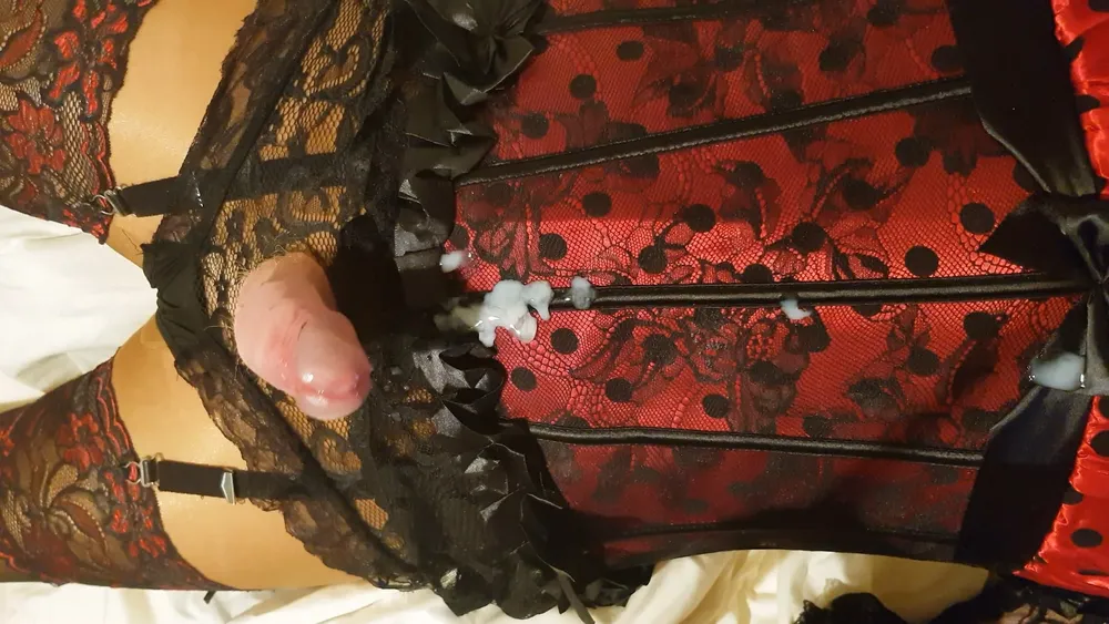 Crossdressing in red polka dot corset and lace knickers #15