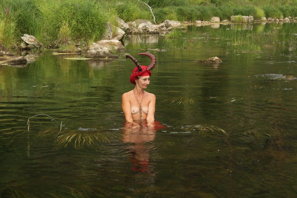 With Horns In Red Dress In Shallow River #46