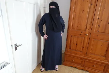 pale skin milf in burqa and niqab and high heels         