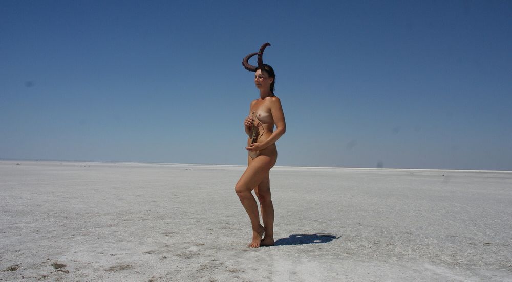 Standing naked on the salt of the salt lake Elton #33