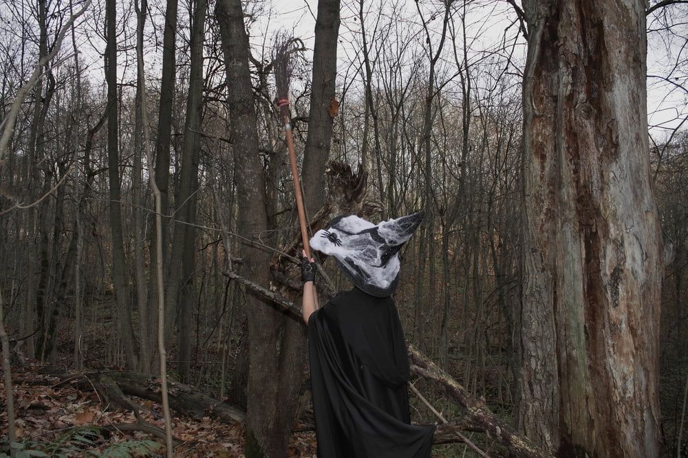 Witch with broom in forest #32