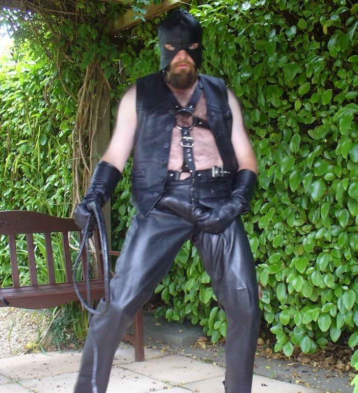 Leather Master outdoors in harness with whip #5