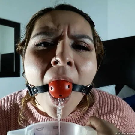 beautiful bitch ball gagged and drooling         