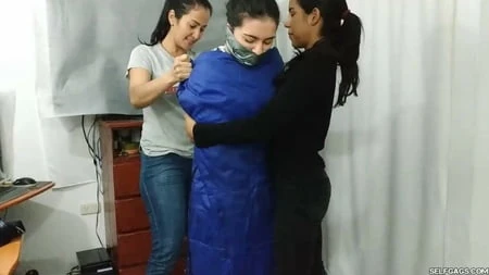 sexy girl trapped in ultra tight layered mummification         