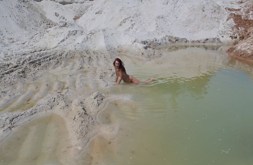 Bathing in white clay quarry #31