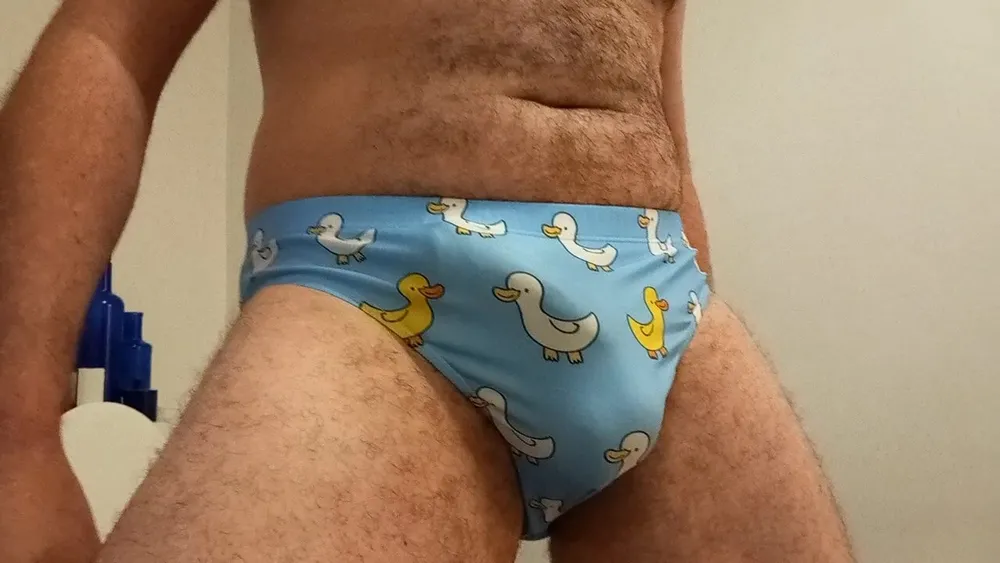 Small penis bulge cum in cute duck speedo, brief, trunks. #14