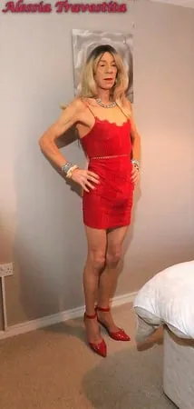    alessia travestita in red velvet dress         