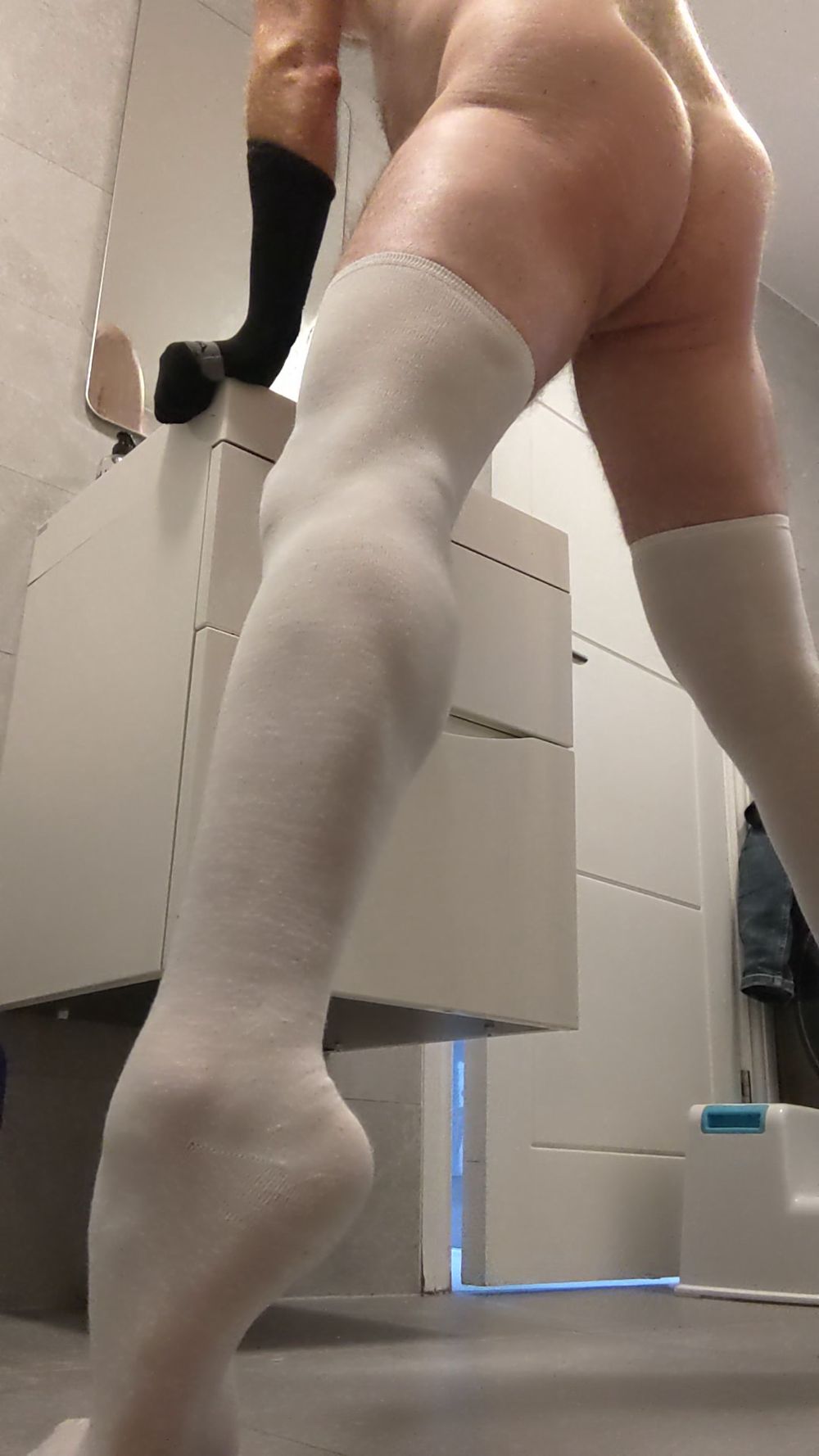 White cotton stockings gripping tightly to feet and legs #2