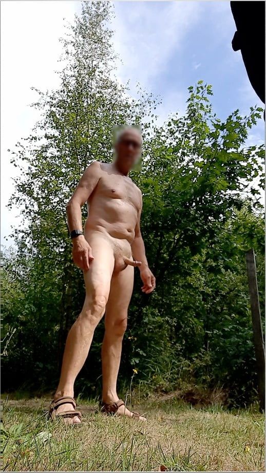naked exhibitionist jerking in public outdoor woods with cum