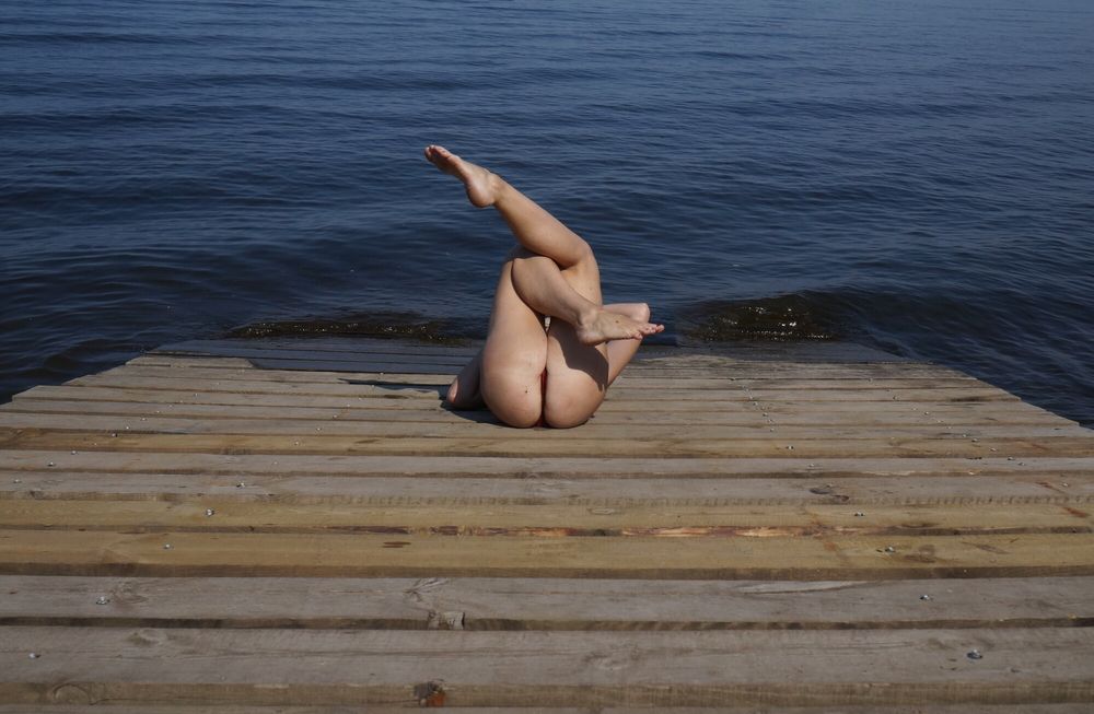 Legs play on a wooden platform #9