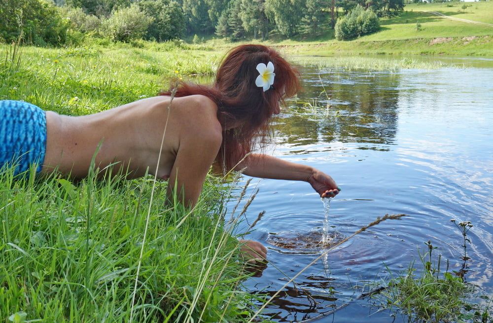 Mermaid plays with water #37