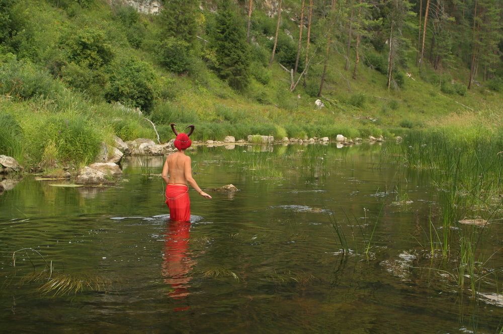 With Horns In Red Dress In Shallow River #10