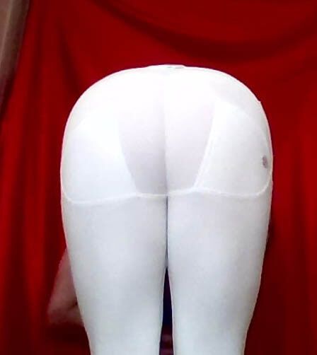 IN A WHITE TIGHT PANTS. #4