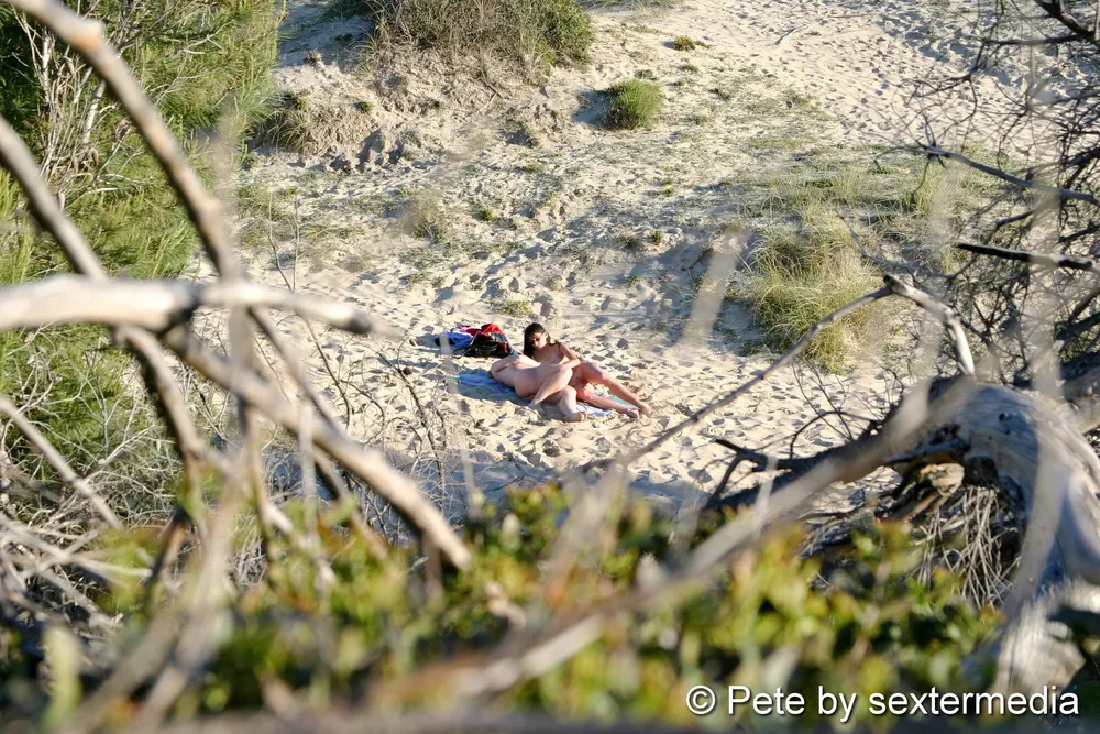 Naked lesbians have fun on the beach #6