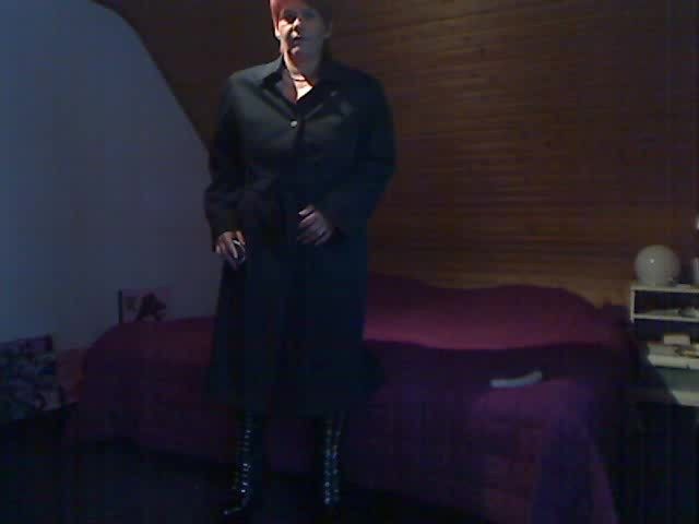 In long patent-leather boots ...