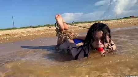 hogtied and ball gagged in sea water selfgags         