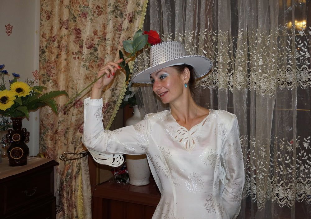 In Wedding Dress and White Hat #9