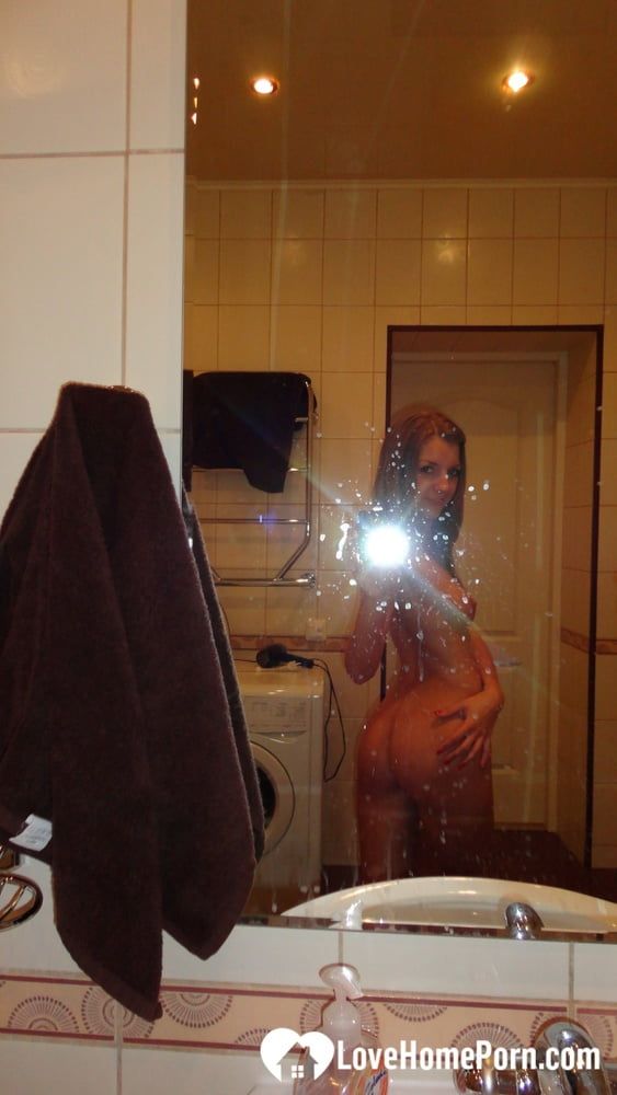 Amateur brunette babe taking selfies before her shower #20