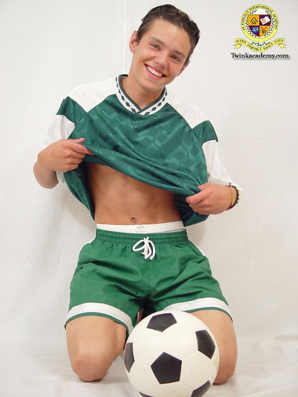 Latino twink Gabriel poses in his soccer kit #9