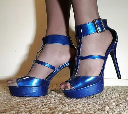 pantyhose and shiny blue heels        