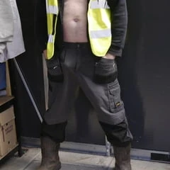 Older workie in his work gear