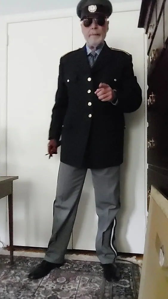 Military officer dressing and in his office 