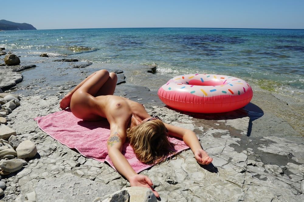  Kinky nudist girl in the public beach #26