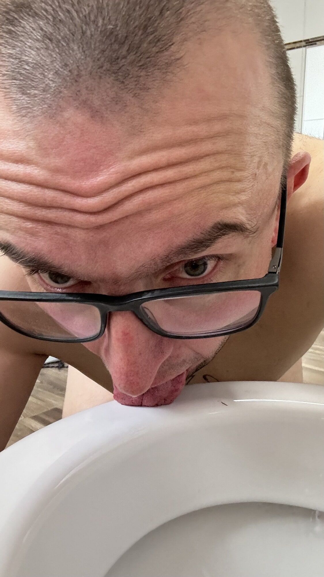 Slave pig has to clean toilet with his tongue #2