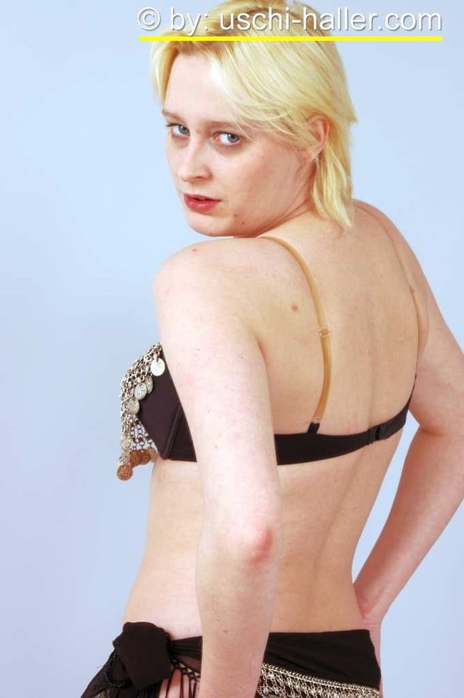 Photo shoot with blonde cum slut Dany Sun as a belly dancer