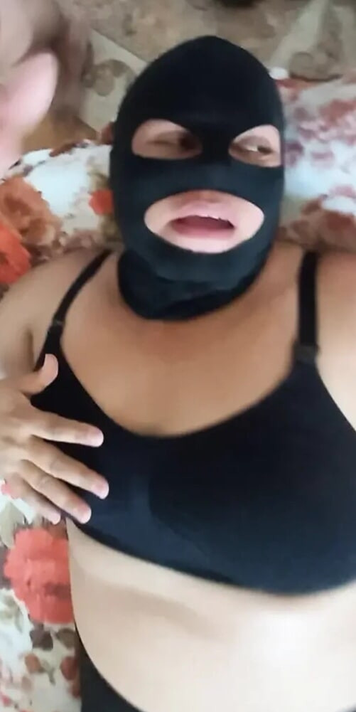 Sucking cock with a mask