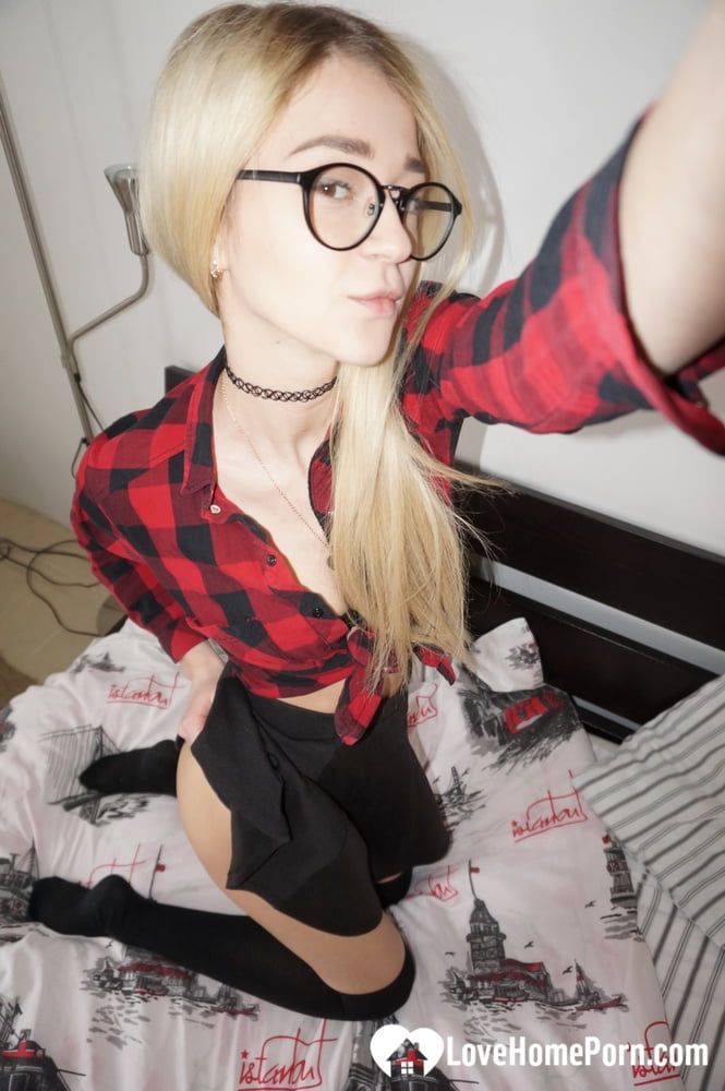 Naughty nerdy schoolgirl strips off her uniform