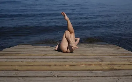 legs play on a wooden platform         