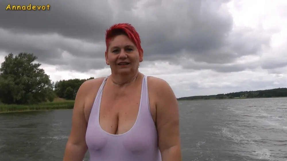 In WHITE SWIMSUIT in the lake