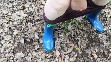 peeing in rubber boots         