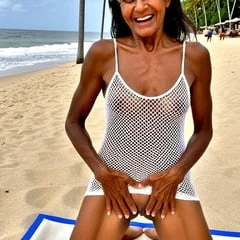 Indian granny loves showing off her pussy at the beach