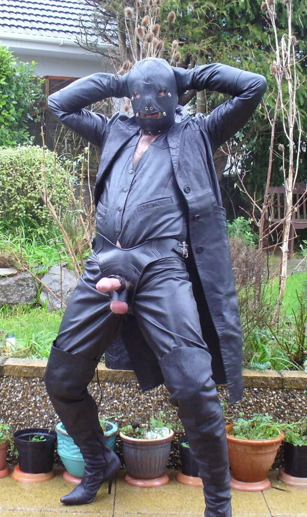 Leather Master in cock harness, boots and hood #6